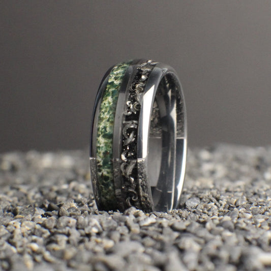 Moss Agate wedding band with meteorite shavings made out of scratch resistant tungsten. This ring comes with a lifetime warranty and is built to last!
