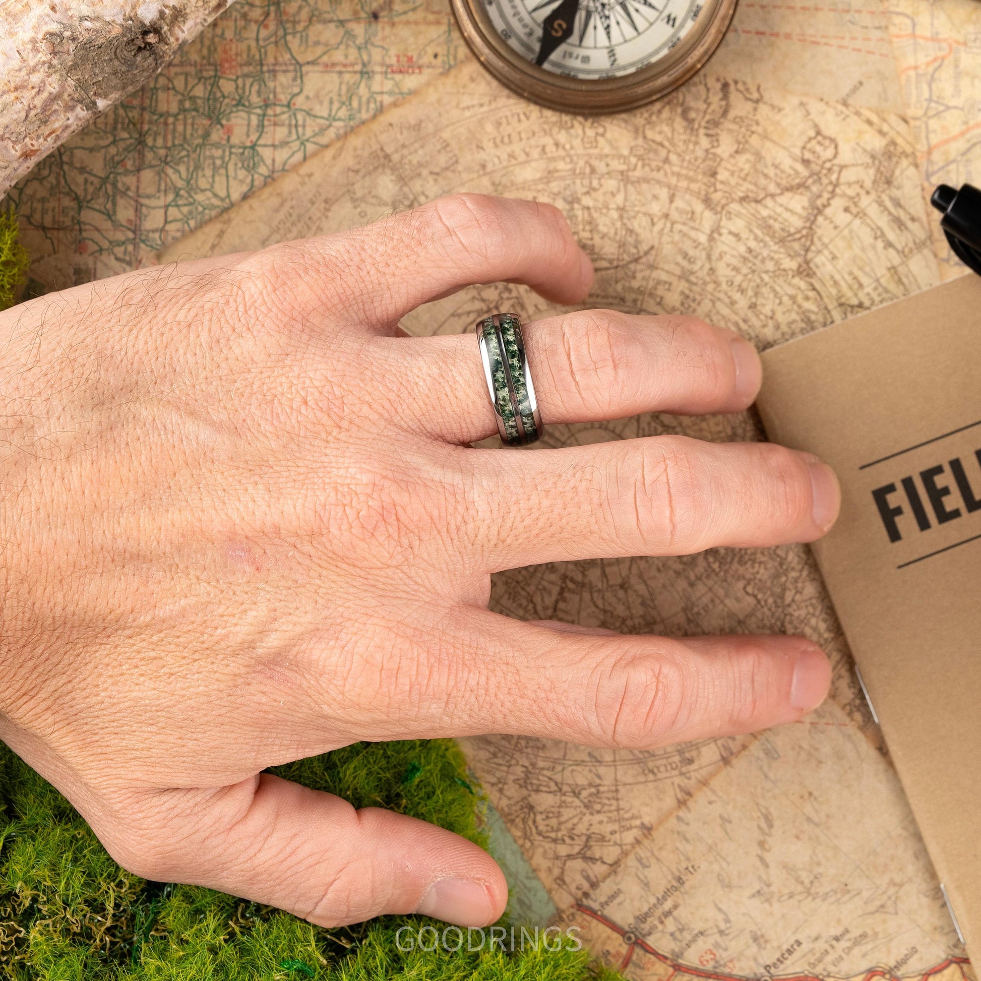Moss agate ring for men on a mans hand