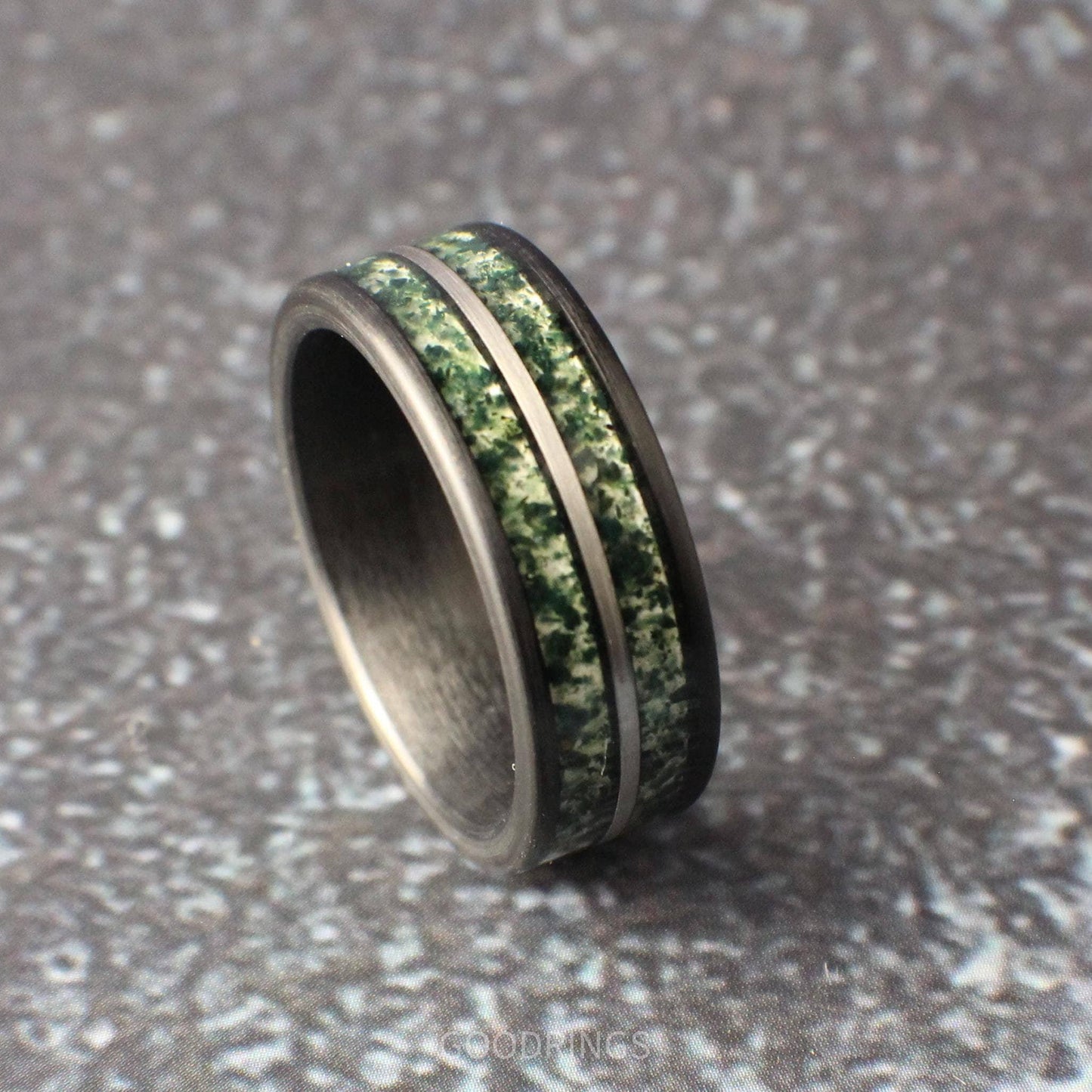 Modern 8mm black tungsten ring featuring dual moss agate channels, separated by a silver stripe; rugged yet elegant, perfect for everyday wear.
