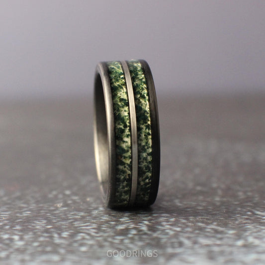 8mm brushed black tungsten men's ring with two channels of moss agate inlay separated by a silver line, durable and stylish wedding or gift ring.