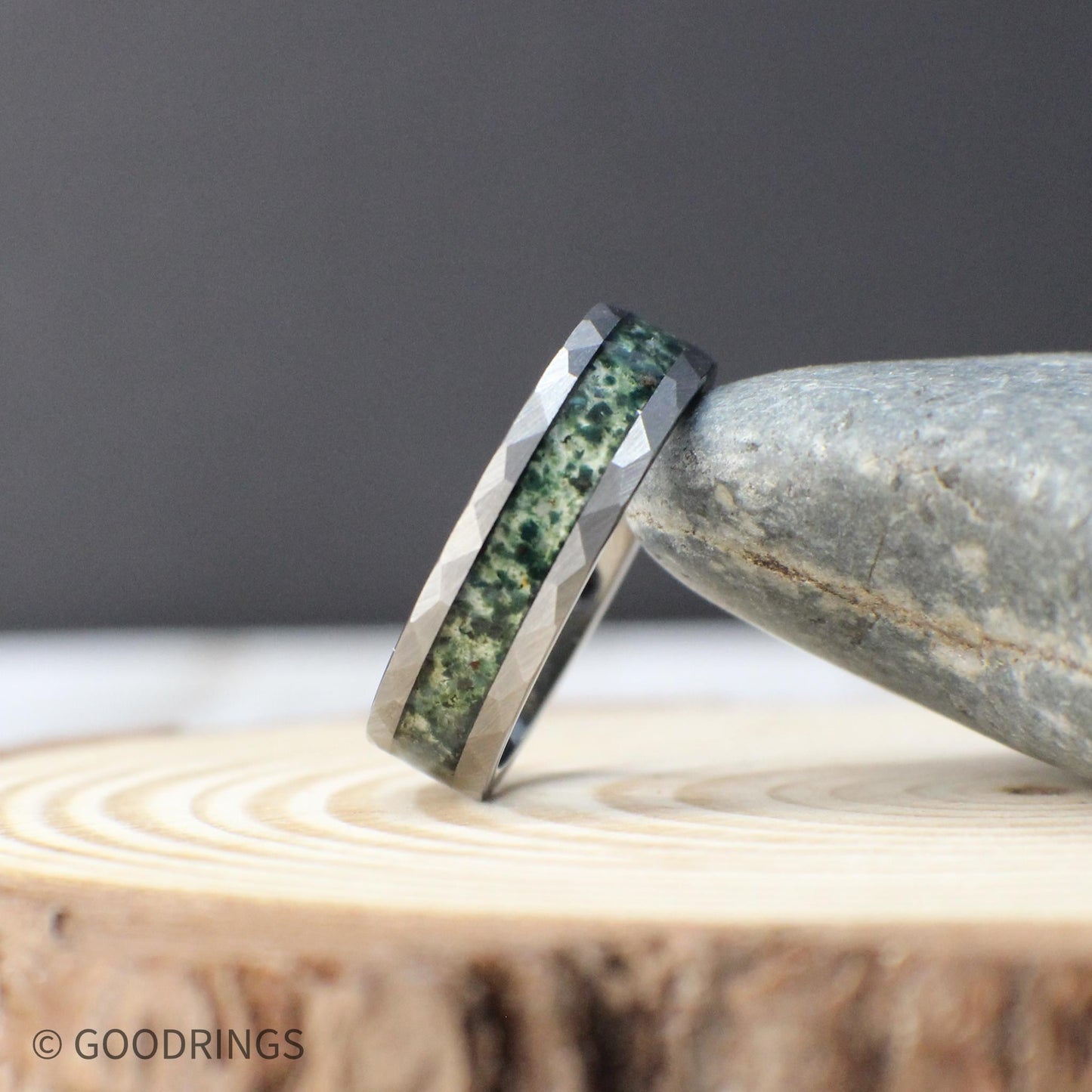Men’s moss agate wedding ring crafted from hammered tungsten. A bold and scratch-resistant ring for grooms, outdoor lovers, or anniversary gifts.