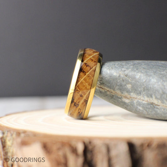 Gold-plated tungsten men’s ring with a domed profile and inlaid whiskey barrel wood. The 8mm wide band combines a polished gold finish with natural grain patterns, offering a blend of rustic charm and timeless elegance—perfect for weddings or everyday wear.