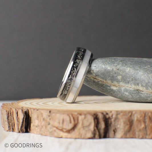 A domed tungsten comfort fit wedding band featuring genuine meteorite and moonstone inlays, designed for durability and style. Includes free returns, free size exchanges, and a limited lifetime warranty with every purchase. Comes in a premium green GoodRings gift box and ships fast.