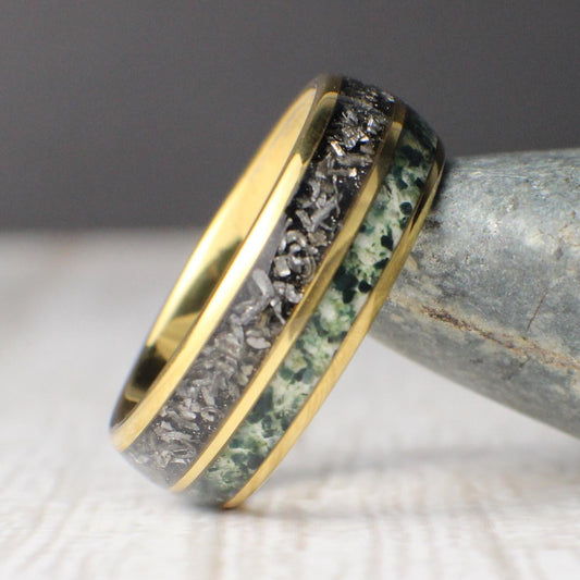 Men’s anniversary ring with 18K gold domed finish, meteorite shavings, and crushed moss agate inlays, comfort fit design.