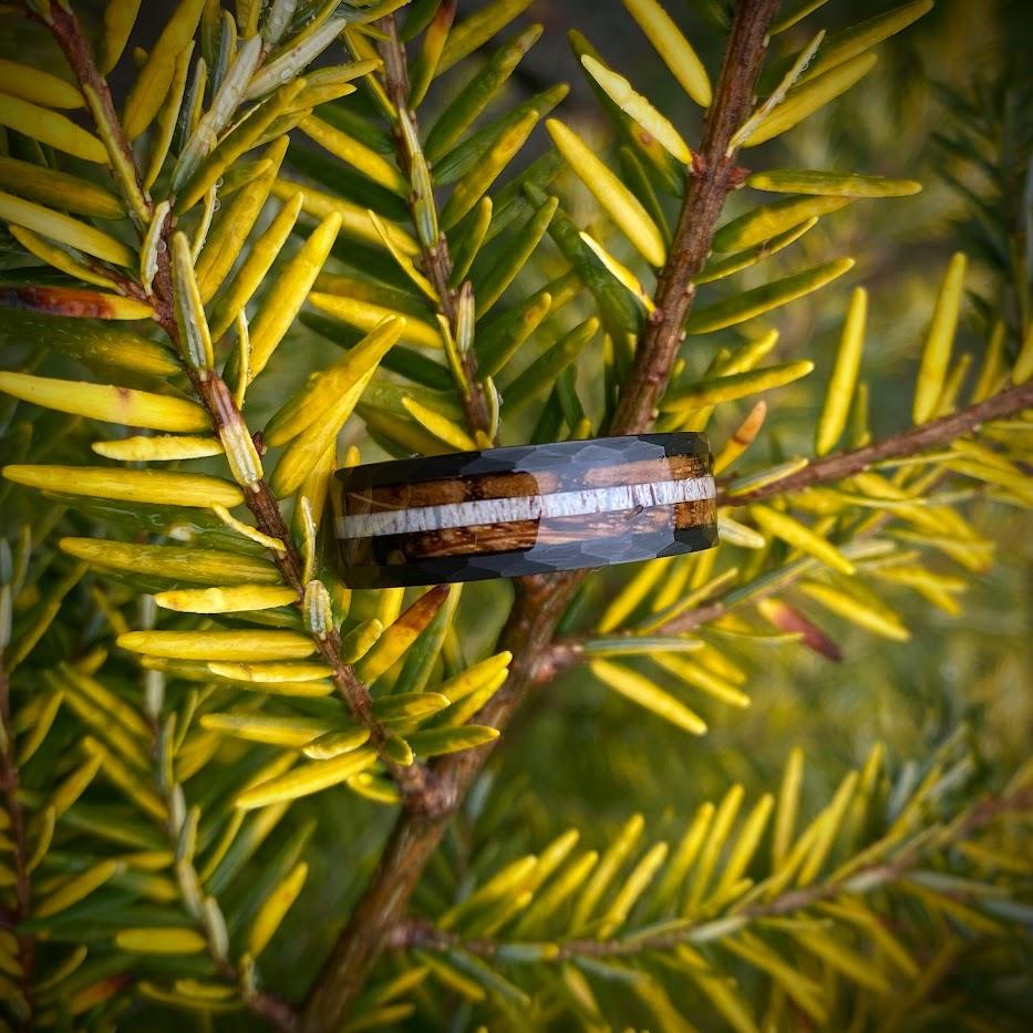 Birds eye view of a whiskey barrel men's tungsten ring