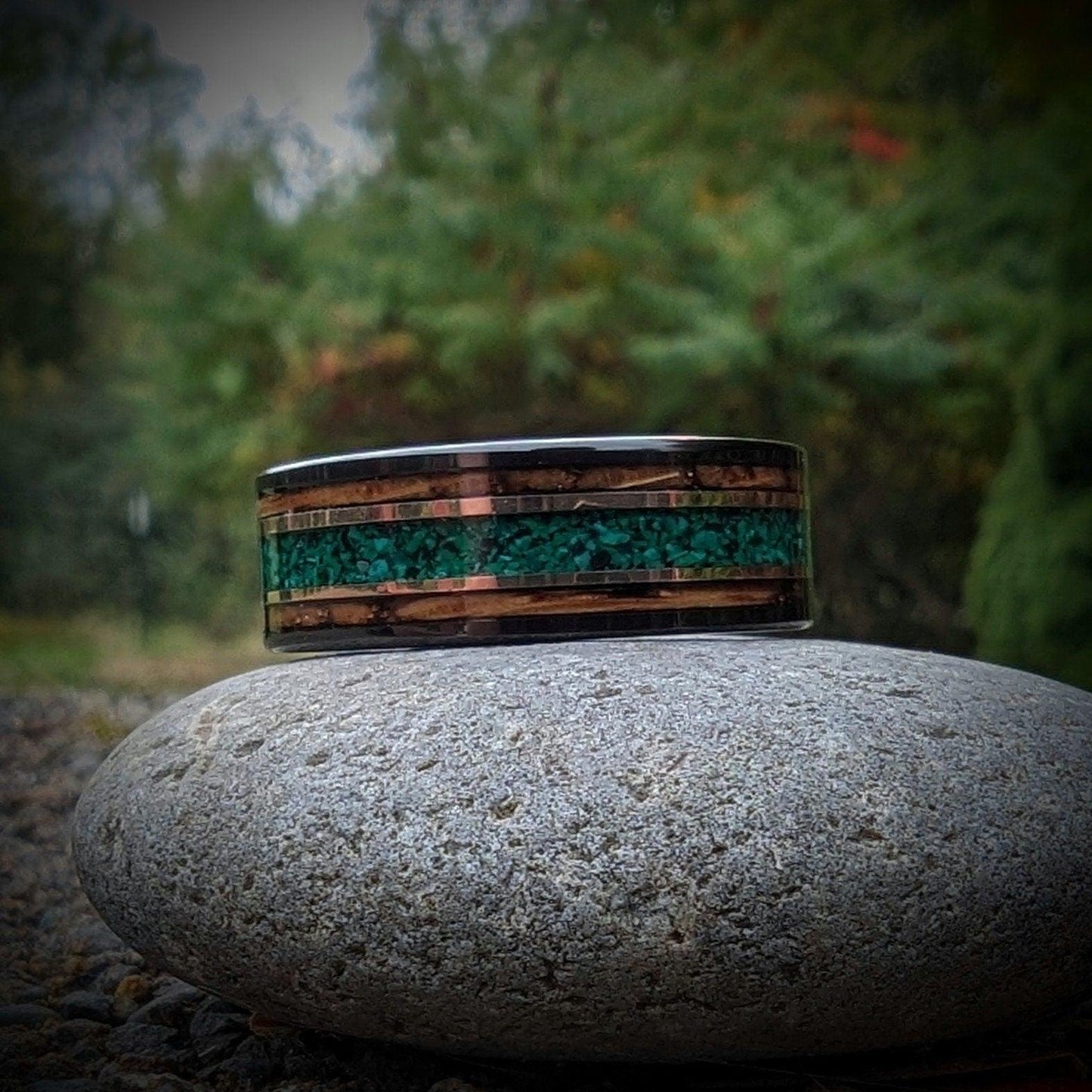 Wedding band made out of burnt whiskey barrel and malachite. Malachite wedding ring.