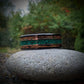 Wedding band made out of burnt whiskey barrel and malachite. Malachite wedding ring.