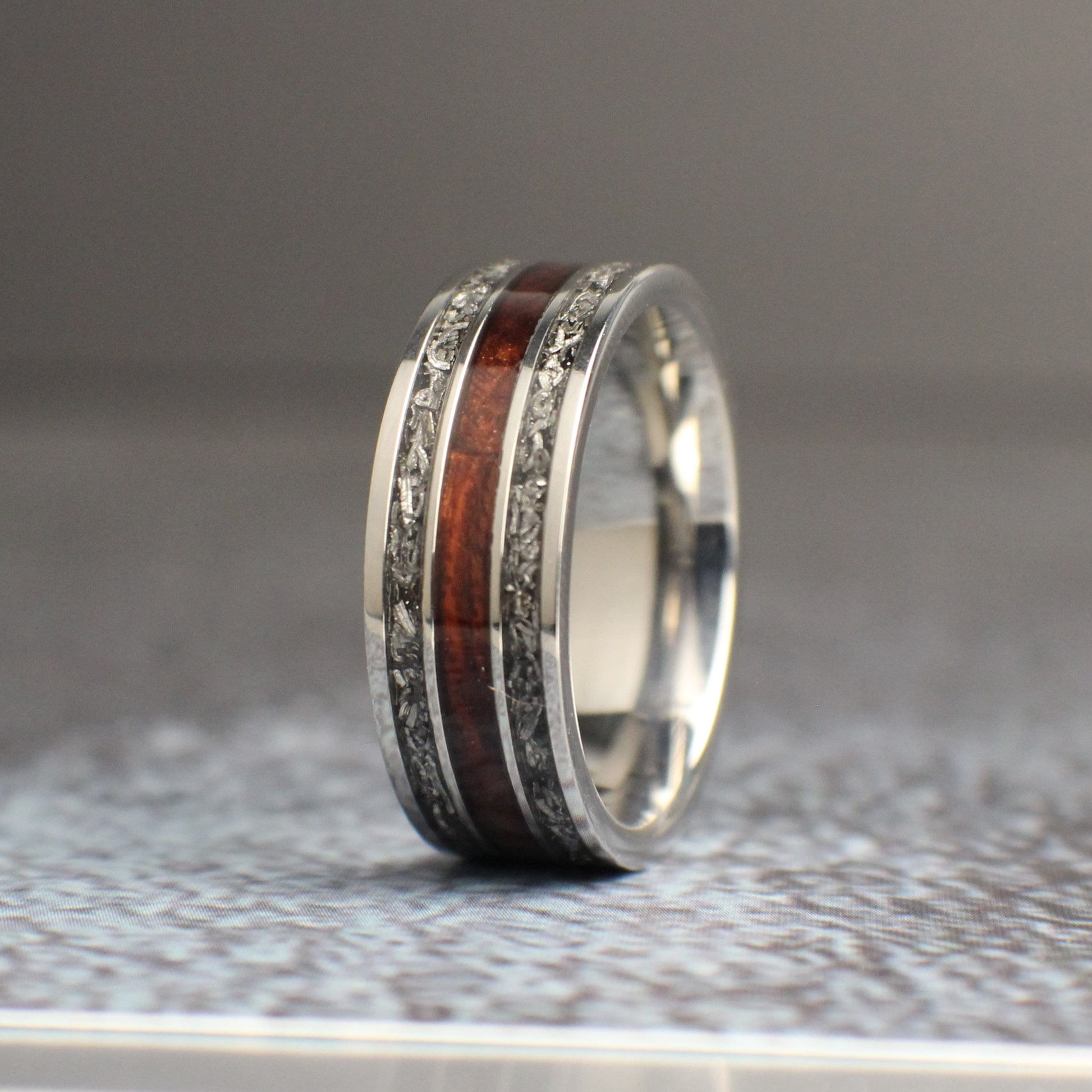 Titanium ring with rosewood and meteorite shavings