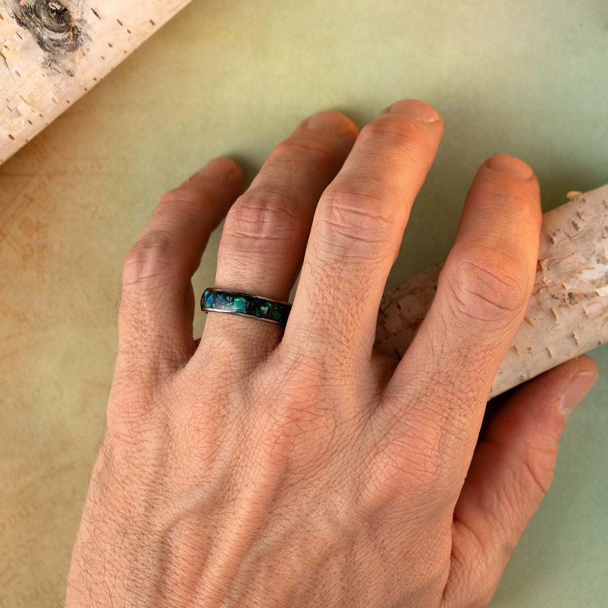 Opal ring on hand