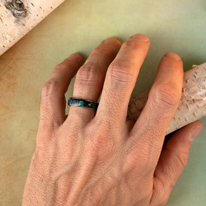Opal ring on hand