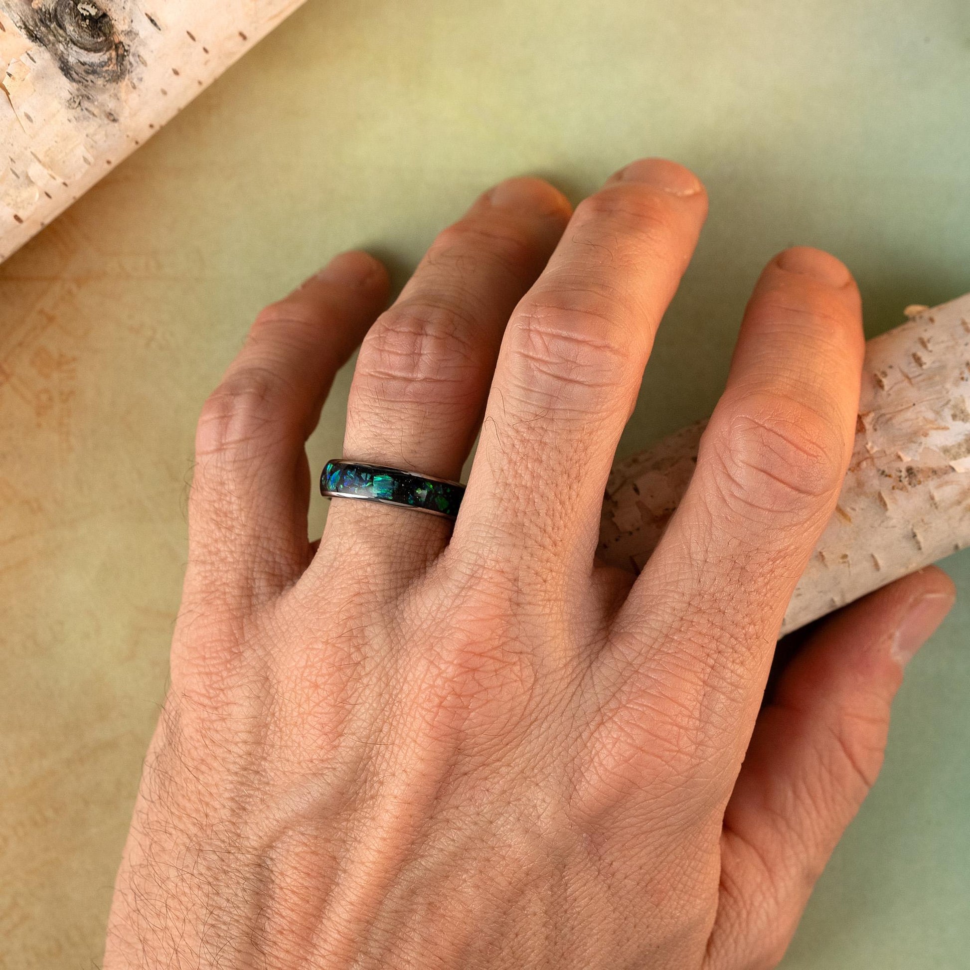 Opal ring on hand