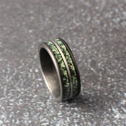 Sophisticated 8mm men’s tungsten ring, brushed black with dual moss agate channels and a silver accent line; bold nature-inspired design.