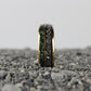 Lustrous 8mm yellow gold ring with a meteorite and moss agate inlay, blending celestial allure with natural beauty.