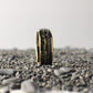 Yellow gold wedding band with a domed profile, highlighted by unique inlays of meteorite and moss agate. Perfect for style and comfort.