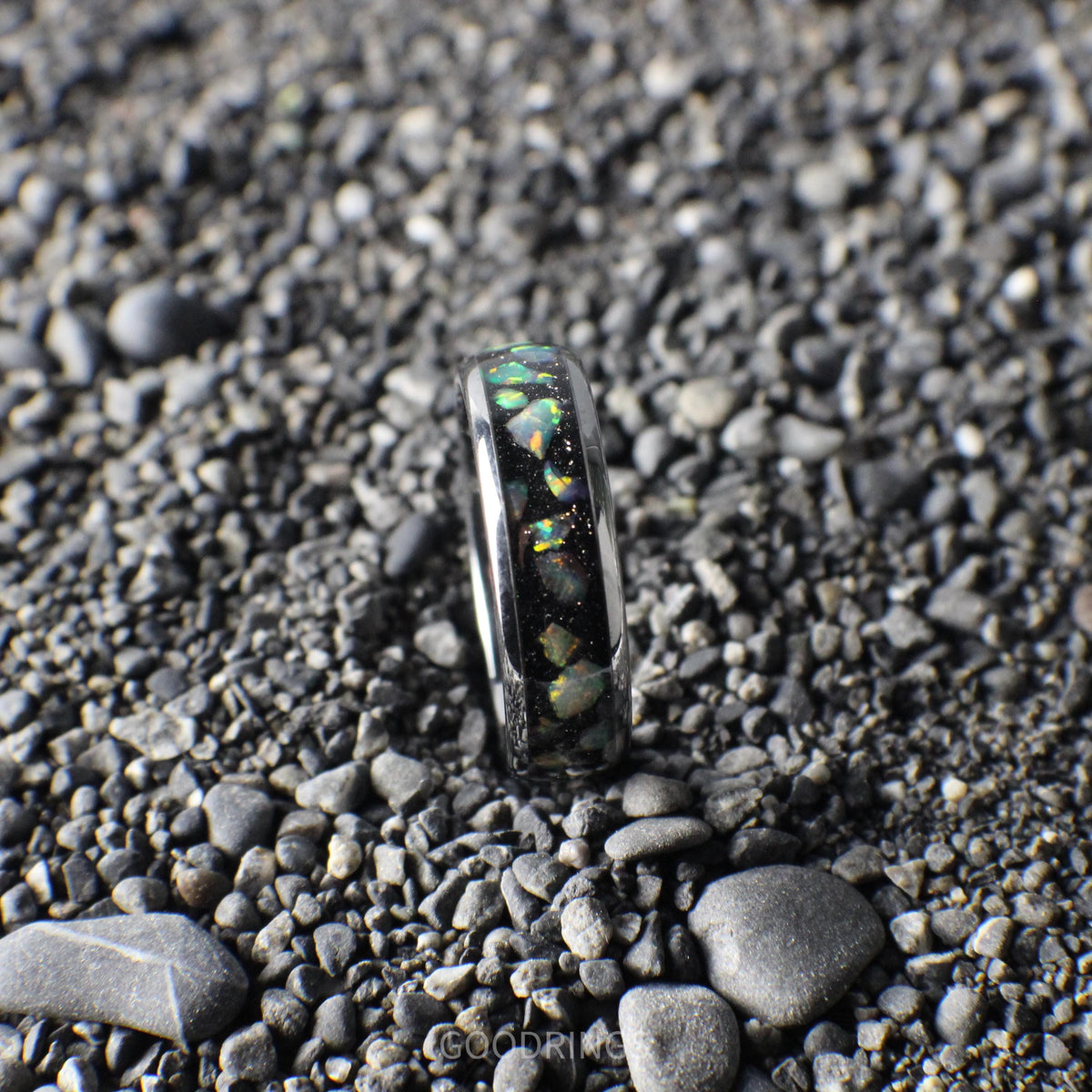 Elegant 6mm silver ring with a comfort-fit design, showcasing a black inlay adorned with iridescent white opals.
