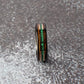 6mm tungsten ring with vibrant malachite, whiskey wood edges, and rose gold lines. A perfect mix of nature and refinement.