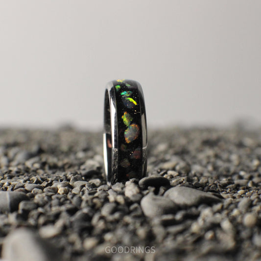 A 6mm silver ring with a comfort-fit core, featuring a sleek black inlay topped with brilliant white opals.