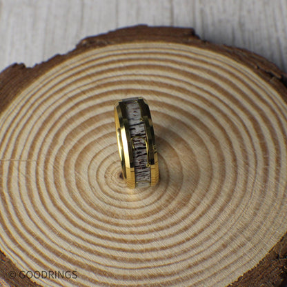 A rustic yet elegant gold-plated tungsten ring with real antler inlay and a fishing hook design, perfect for those who love the outdoors.