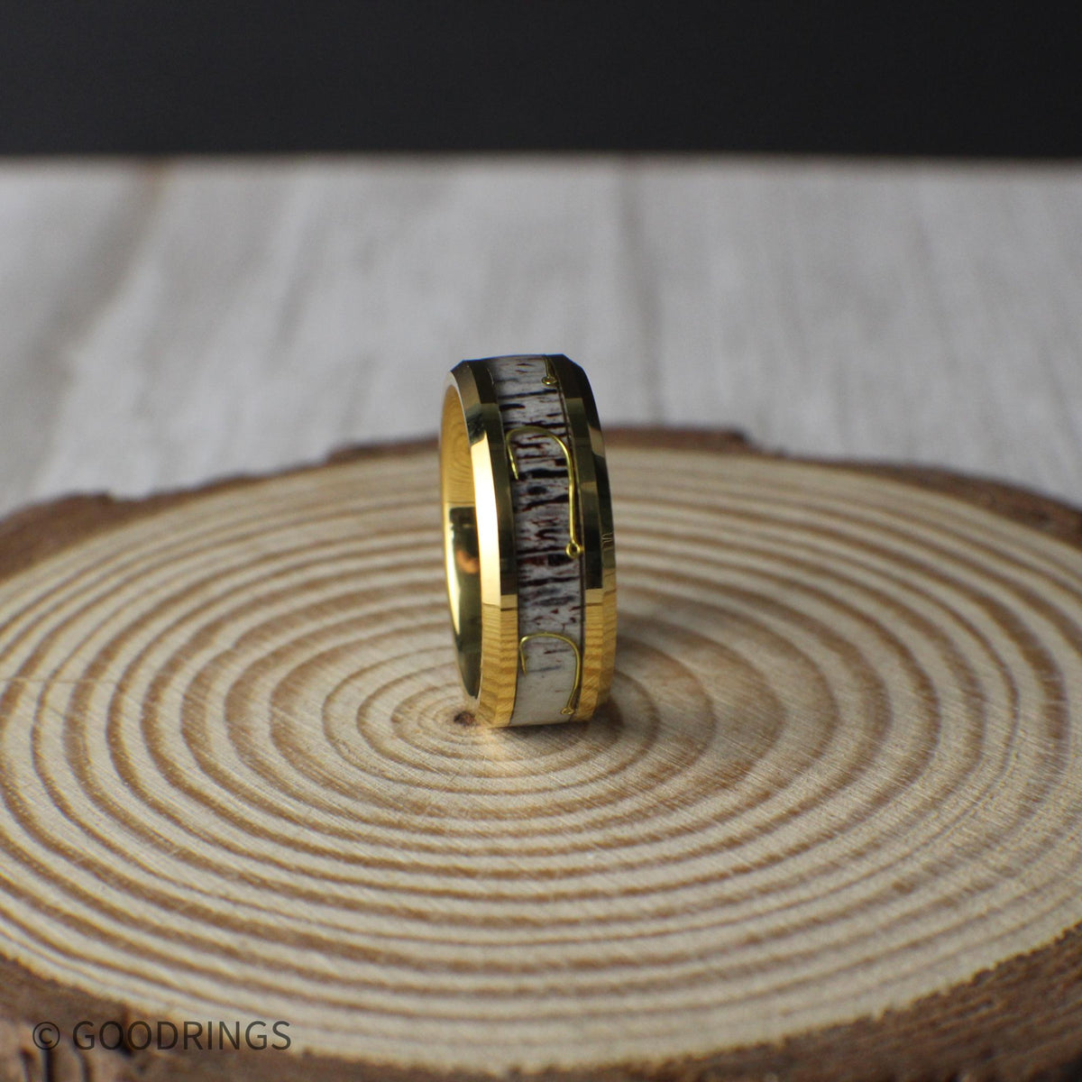 Crafted from durable gold-plated tungsten, this 8mm ring features a unique antler inlay and a finely detailed fishing hook emblem.