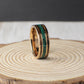 8mm tungsten wedding band featuring rose gold plating, genuine charred whiskey barrel, and a striking malachite inlay. Comes with a gift box, free ring sizer, and silicone ring for added convenience.