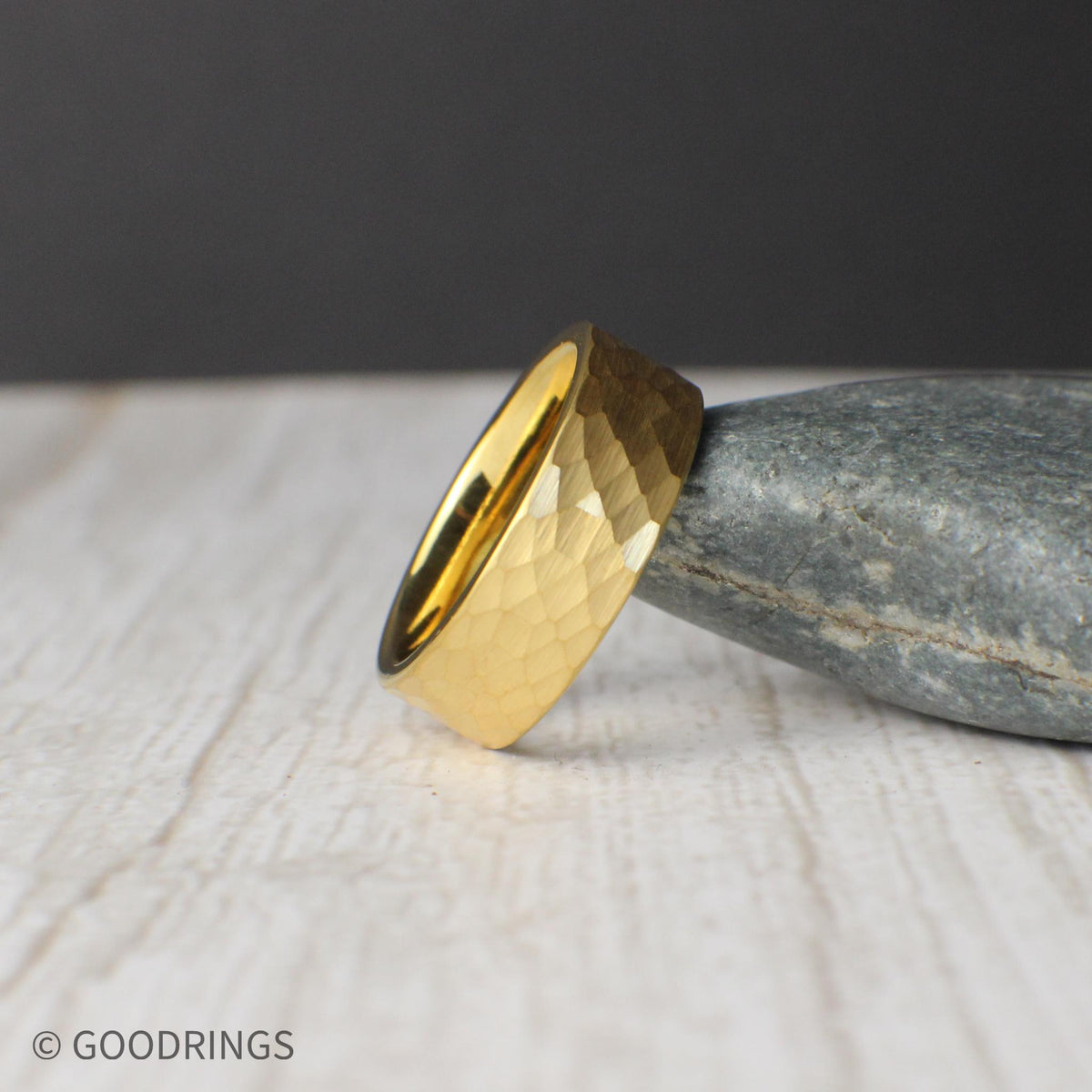 An 8mm hammered tungsten ring with a rich 18K gold plated surface, offering a perfect mix of simplicity and elegance. Ideal for weddings or everyday wear, this ring comes with a silicone band, ring sizer, and gift box. Durable tungsten ensures long-term wear, while the lifetime warranty and easy returns provide peace of mind for shoppers seeking style and reliability in one package.