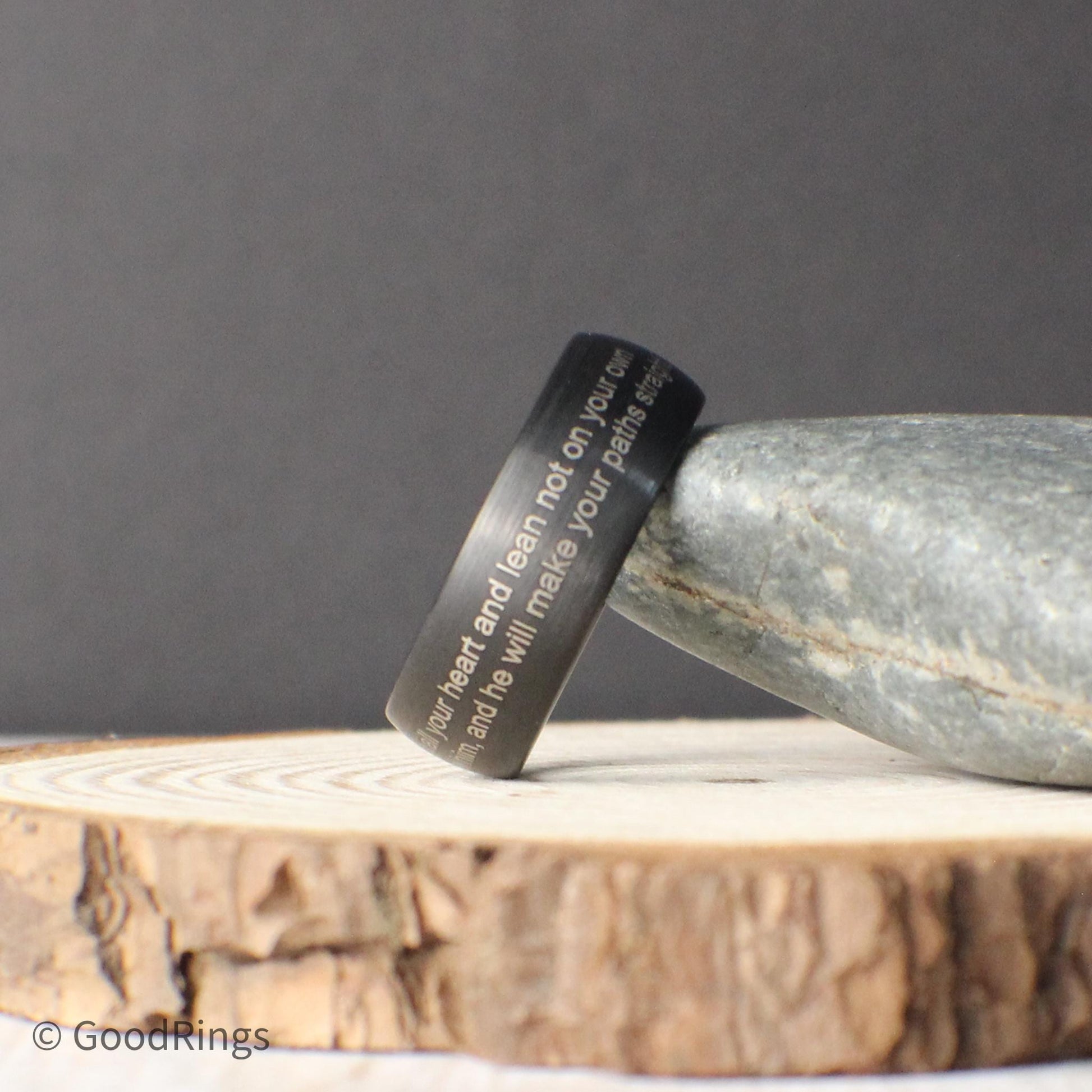 Faith meets craftsmanship in this brushed domed tungsten ring, available with or without an engraved cross. At 8mm wide, it offers a bold yet refined look, perfect for weddings, anniversaries, or spiritual milestones. The ring can be customized with any Bible verse or personal quote, making it a meaningful and unique gift. A beautiful way to wear your beliefs close, every day.