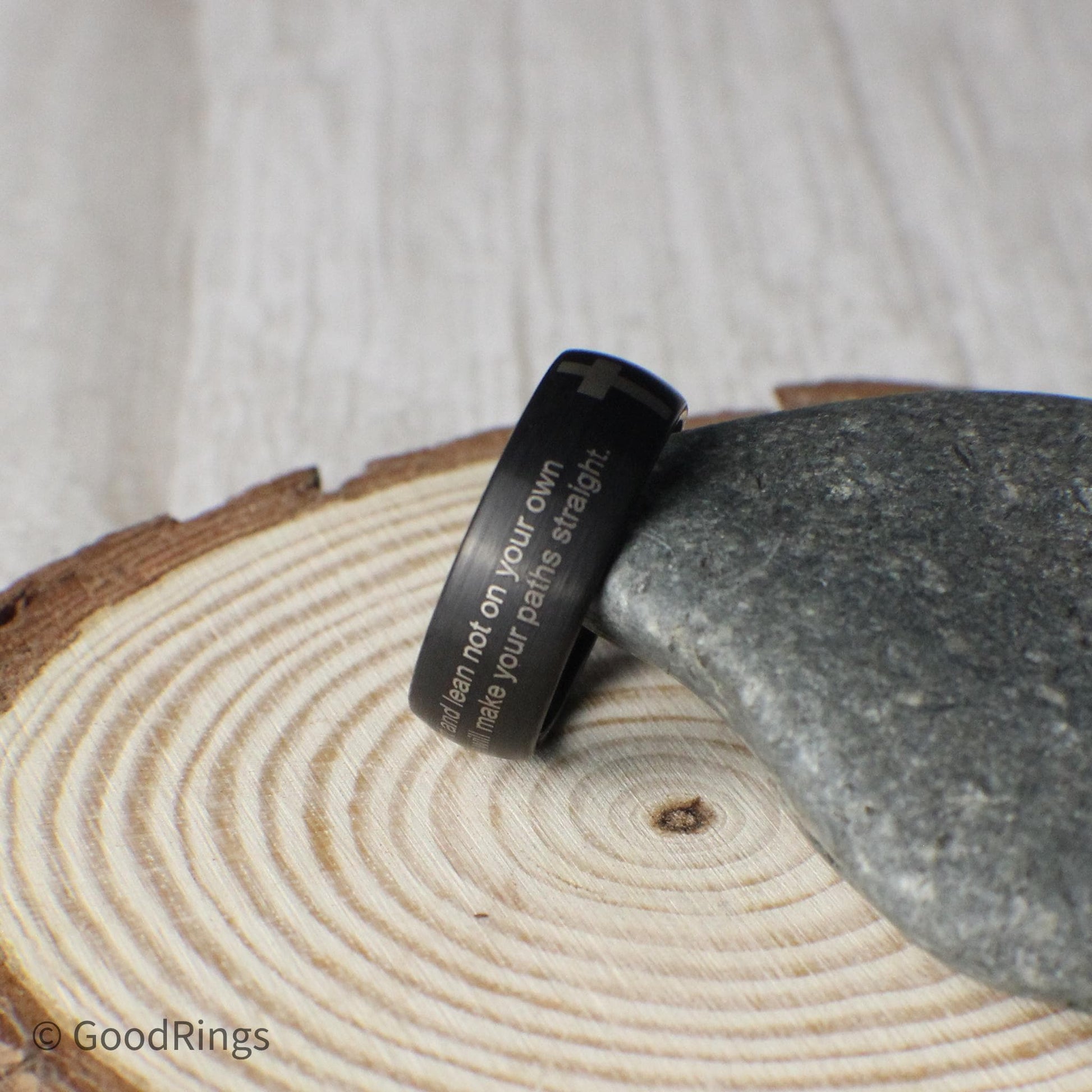 This custom tungsten ring features a brushed, domed design and a sleek 8mm profile. It can be engraved with your chosen Bible verse or quote and includes an optional engraved cross for added meaning. A thoughtful gift for weddings, anniversaries, or spiritual milestones, this ring blends strength, style, and sentiment—making it a timeless piece for anyone looking to wear their faith with pride.