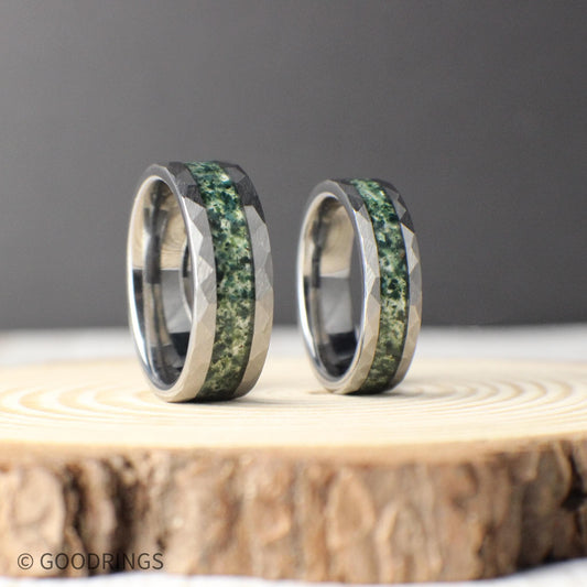 Hammered tungsten ring with moss agate inlay, available in 6mm and 8mm widths. Durable men's wedding band with comfort-fit interior and a nature-inspired design.
