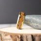 Gold-plated tungsten men’s ring with a domed profile and inlaid whiskey barrel wood. The 8mm wide band combines a polished gold finish with natural grain patterns, offering a blend of rustic charm and timeless elegance—perfect for weddings or everyday wear.