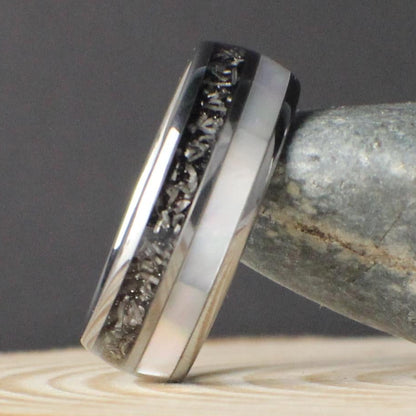 A domed tungsten comfort fit wedding band featuring genuine meteorite and mother of pearl inlays, designed for durability and style. Comes in a premium green GoodRings gift box and ships fast.