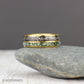 Promise ring crafted from tungsten with polished gold finish, featuring meteorite and moss agate accents, backed by warranty.