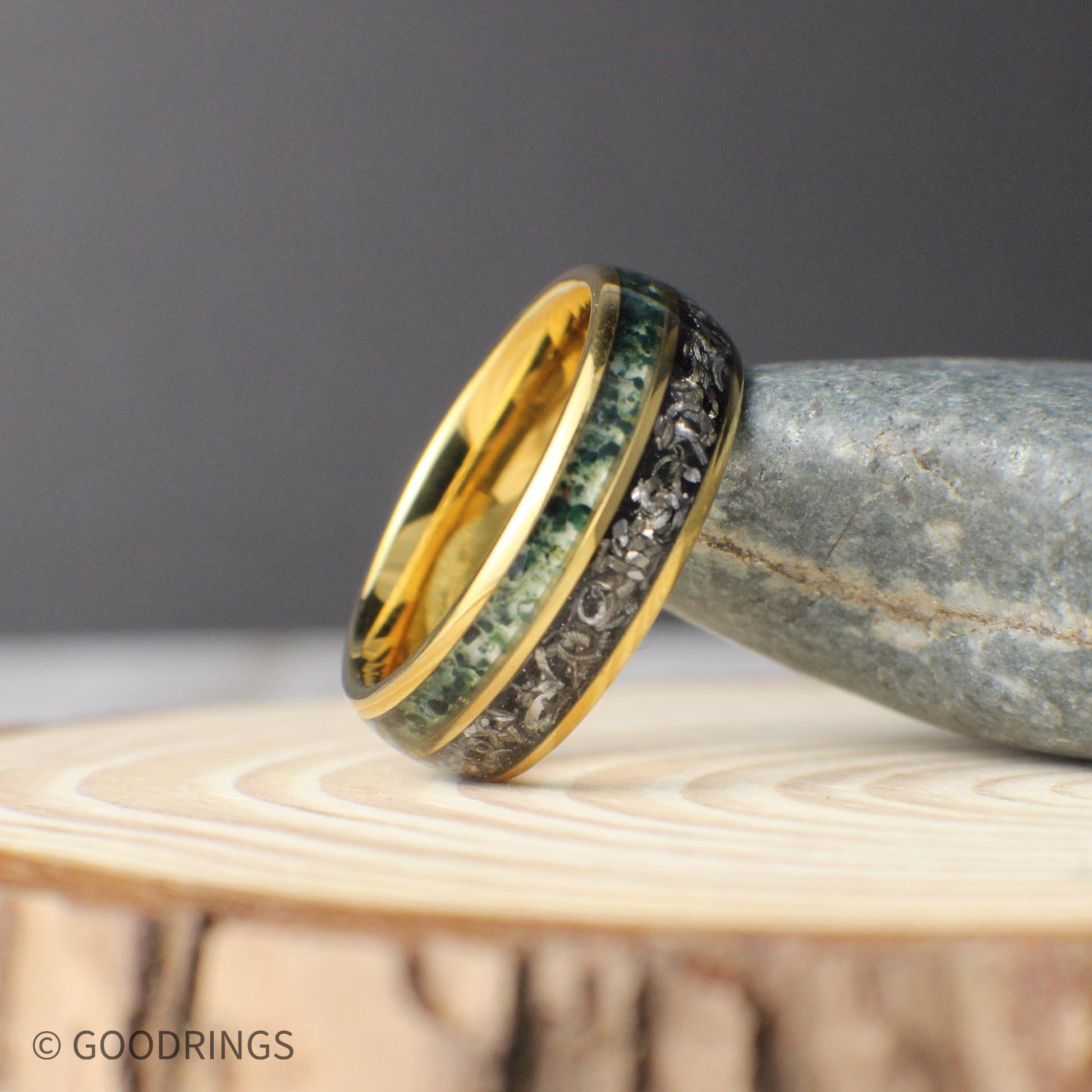 Elegant men’s anniversary band combining gold tungsten with natural meteorite shavings and moss agate in a domed design.