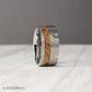 10mm tungsten wedding band inspired by the mechanical design of a revolver, featuring detailed grooves carved into the brushed metal band. The centerpiece is an inlay of charred whiskey barrel wood, showcasing natural texture and heritage against the sleek durability of tungsten. Rugged yet refined, this masculine ring makes a unique choice for weddings, anniversaries, or everyday wear.