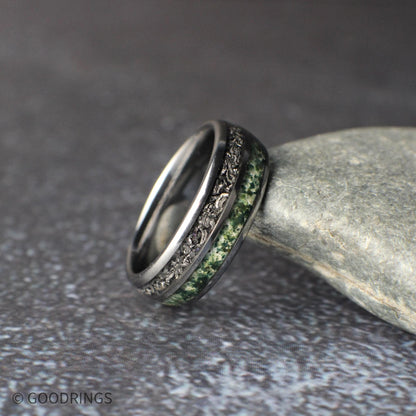 His and hers wedding ring set designed for couples, featuring a wider 8mm tungsten band with meteorite and moss agate inlays paired with a slim 4mm moss agate ring. Both rings are photographed together to showcase their complementary widths, shared materials, and modern, minimalist style ideal for matching wedding bands.