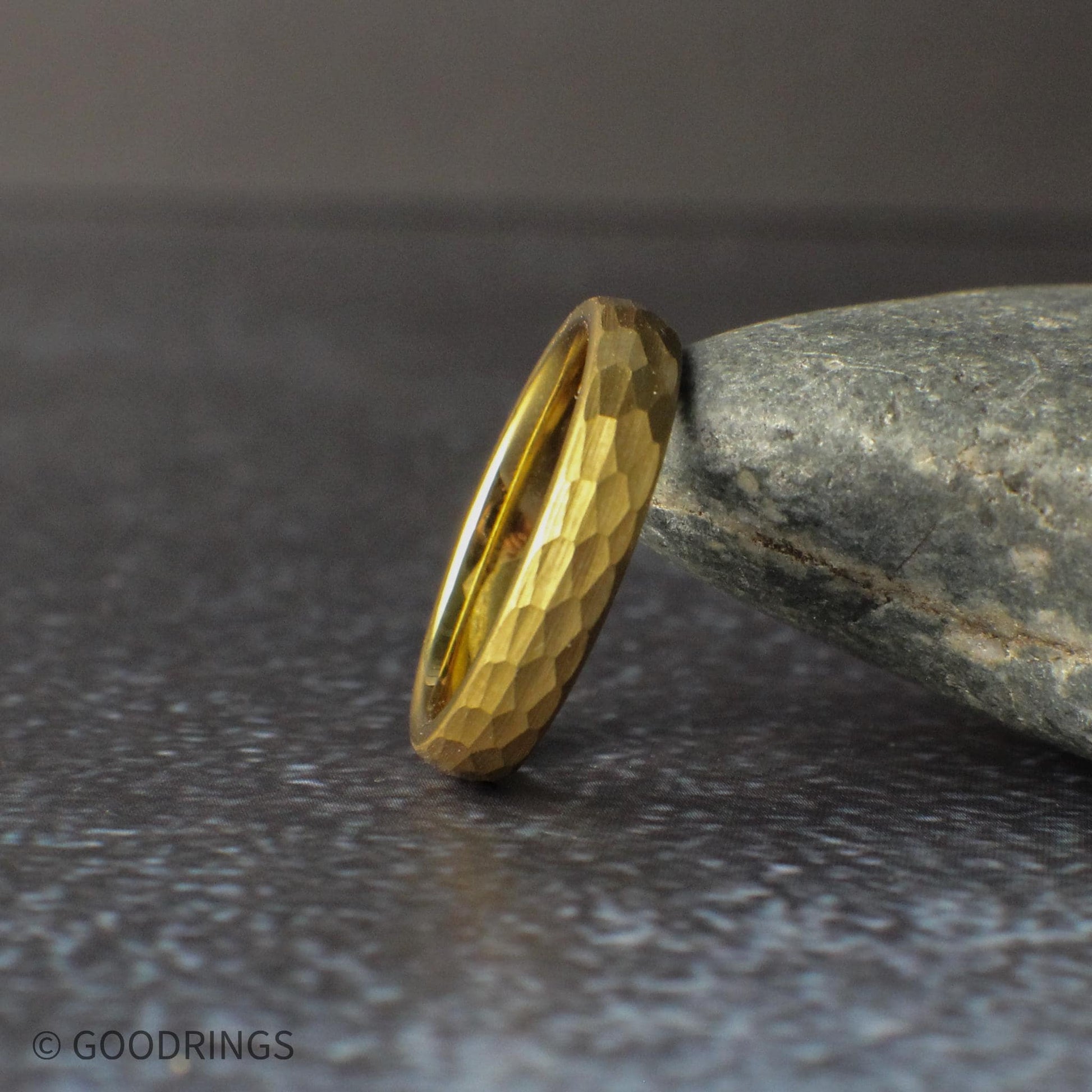 Medium width hammered gold tungsten ring in 4mm size showing the balance between minimal and bold design. The 18K gold plated finish and textured surface create a modern yet timeless look, ideal for women’s wedding bands, unisex rings, or everyday wear.