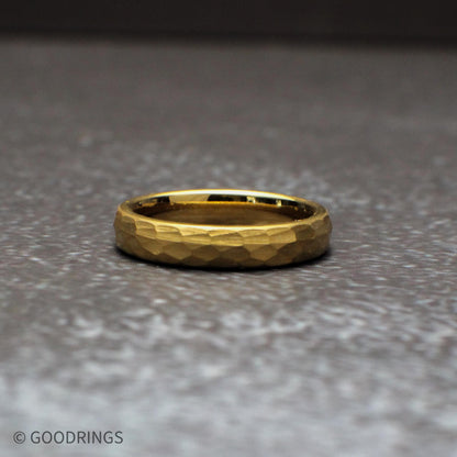 Hammered gold tungsten couple rings in multiple widths, perfect for matching wedding bands. The textured surface adds character while the gold finish keeps the design timeless, making these rings ideal for couples who want a coordinated but unique look.