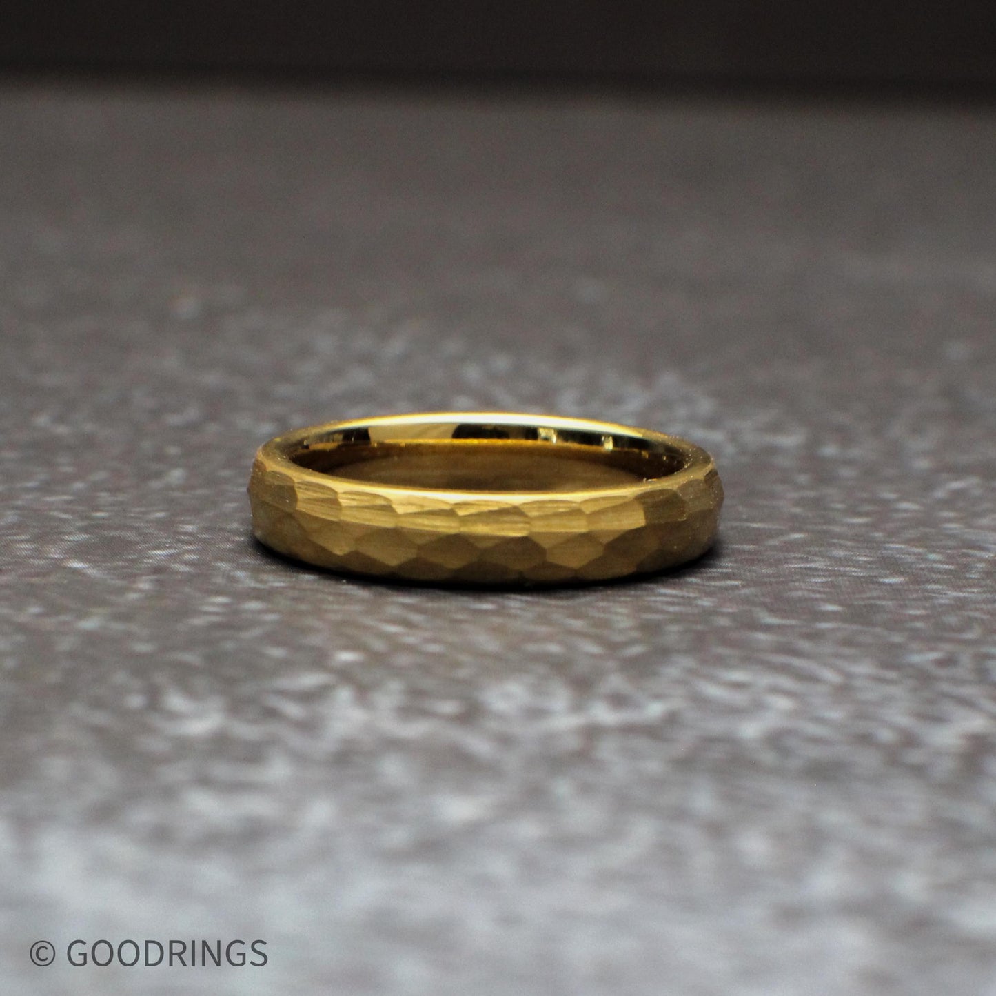 Hammered gold tungsten couple rings in multiple widths, perfect for matching wedding bands. The textured surface adds character while the gold finish keeps the design timeless, making these rings ideal for couples who want a coordinated but unique look.