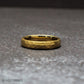 Hammered gold tungsten couple rings in multiple widths, perfect for matching wedding bands. The textured surface adds character while the gold finish keeps the design timeless, making these rings ideal for couples who want a coordinated but unique look.