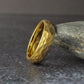 Classic 6mm hammered gold tungsten wedding band with a domed shape and textured finish. This ring offers a traditional width with a modern twist, making it a perfect choice for men’s wedding bands or anyone wanting a durable gold ring with added visual interest.