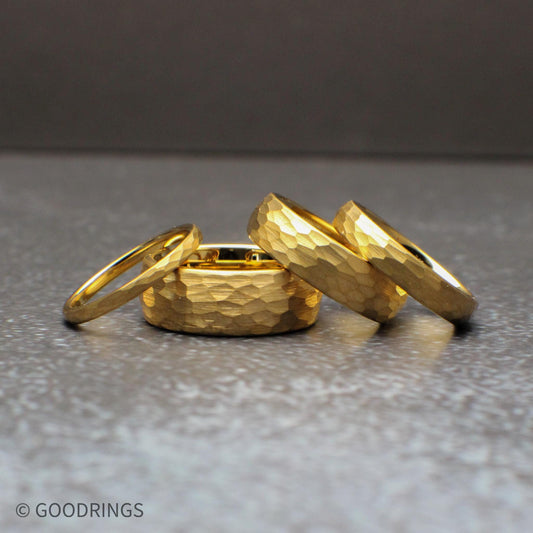 Hammered gold tungsten ring set in multiple widths including 8mm, 6mm, 4mm, and 2mm, featuring a domed profile and textured surface that reflects light beautifully. This 18K gold plated wedding band offers a durable tungsten core with a modern yet timeless look, perfect for men’s and women’s wedding bands, minimalist jewelry lovers, and matching couple ring sets.