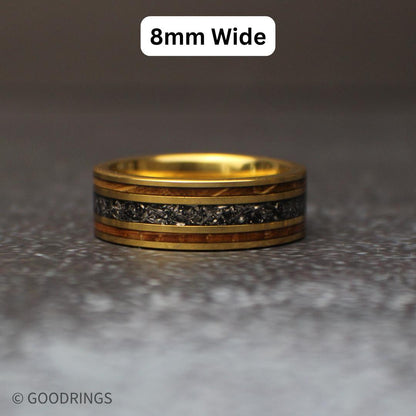 A wedding ring laying flat on a dark background with text above it that says 8mm wide.