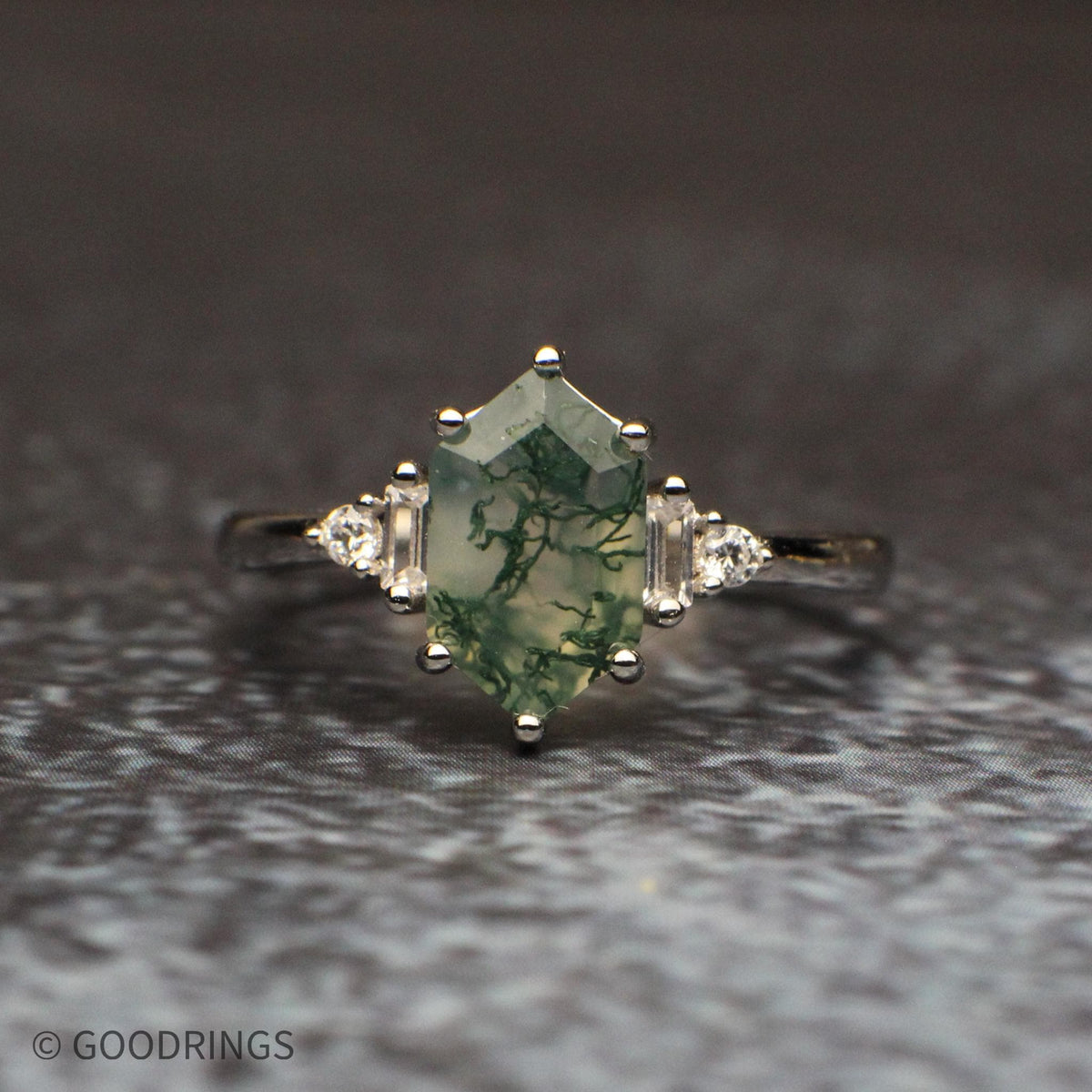 Moss agate ring close up to show details in stone