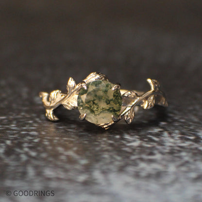 Picture of Moss Agate wedding band on a dark background