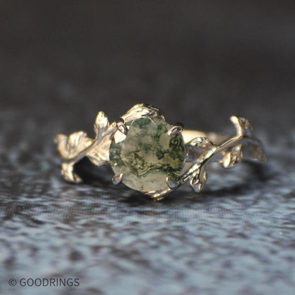 leafs that wrap around engagement band with moss agate stone setting