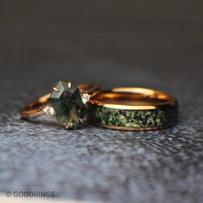 wedding set showing a moss agate ring leaning on the mens moss agate ring
