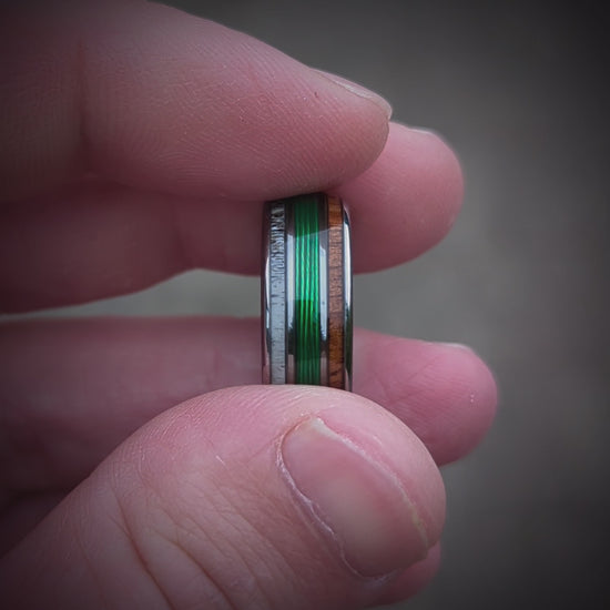 Video of the fishing line wedding band. The ring has green fishing line in the center and is bordered by Elk antler and Makore wood!