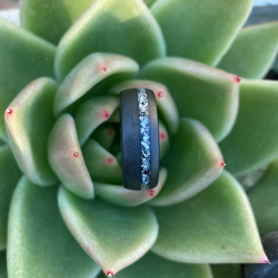 Manly wedding ring in a succulent plant