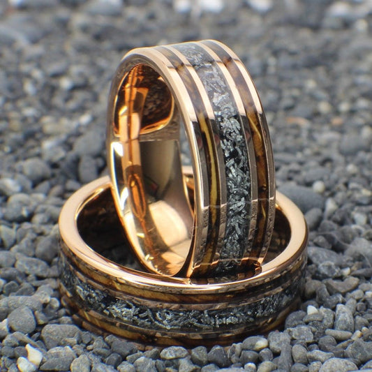 Meteorite wedding band. Wedding band made out of 18K Rose Gold and inlayed with whiskey barrel wood and meteorite shavings.