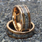 Meteorite wedding band. Wedding band made out of 18K Rose Gold and inlayed with whiskey barrel wood and meteorite shavings.