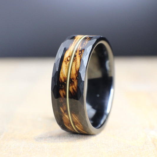 Burnt whiskey barrel wedding band with guitar string